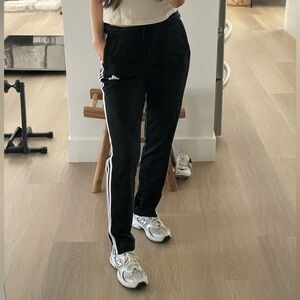 Adidas track pants with zipper at the ankle. Men’s sz S. Fits like women’s M